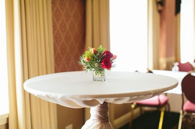 Cocktail table with small floral centerpiece